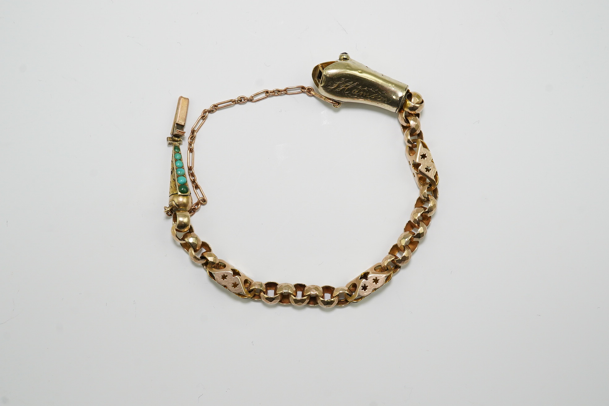 A Victorian gold and turquoise cluster set serpent bracelet